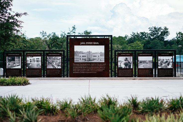 momument at cascades with civil rights moments in photos