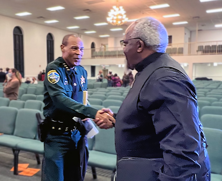 two men shaking hands