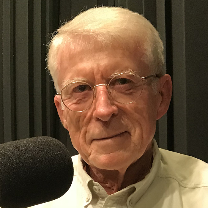 Jim in front of a microphone at WFSU