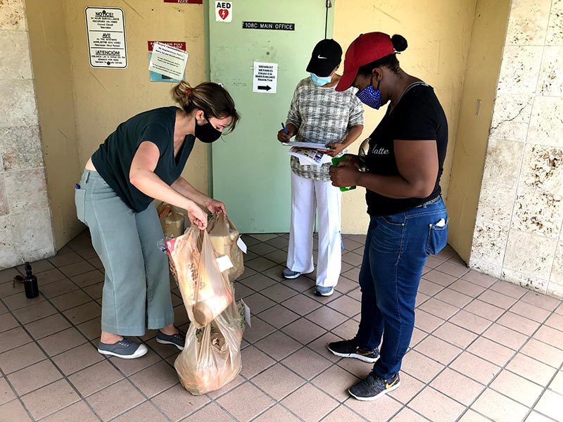 groceries being given to parent